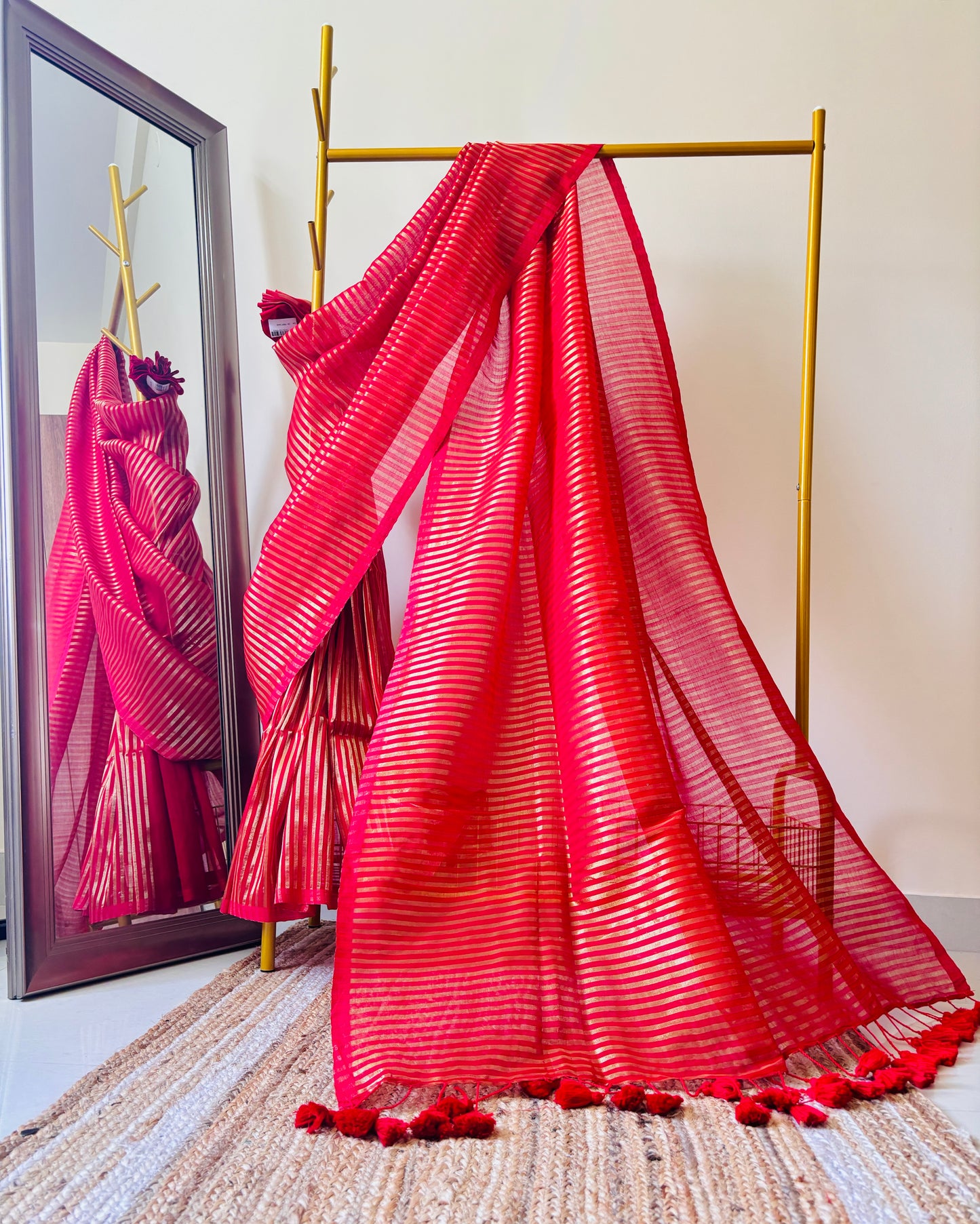 Mulmul Handwoven zari Saree with Vertical gold Stripes and Tassles