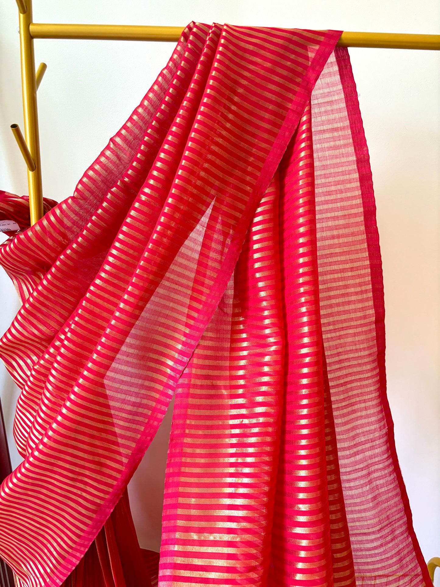 Mulmul Handwoven zari Saree with Vertical gold Stripes and Tassles