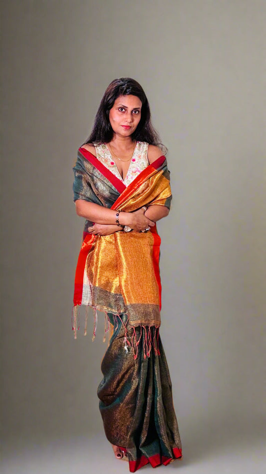 Teal Green tissue linen saree with golden zari pallu